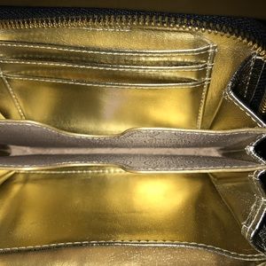 Michael Kors Bags - Michael Kors zip around wallet Michael Kors Bags - Michael Kors zip around wallet